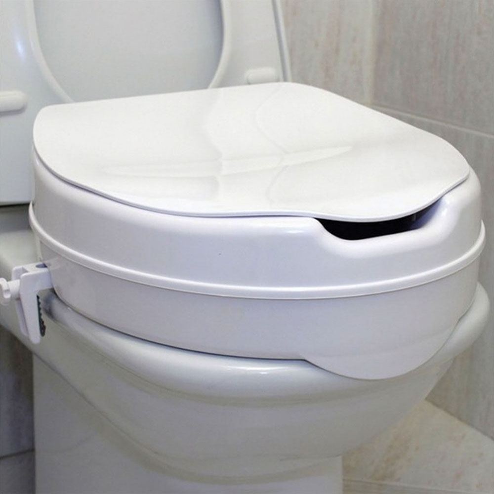 Kibath Asiento Elevador para wc, redondo de acabado blanco mate fabricado en ABS
